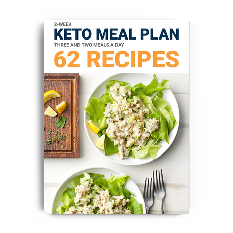 Dr. Berg's 2-week Keto Meal Plan: Digital version with 62 recipes. Cover shows two plates of chicken salad lettuce wraps, sliced lemons, a cutting board, and two forks.