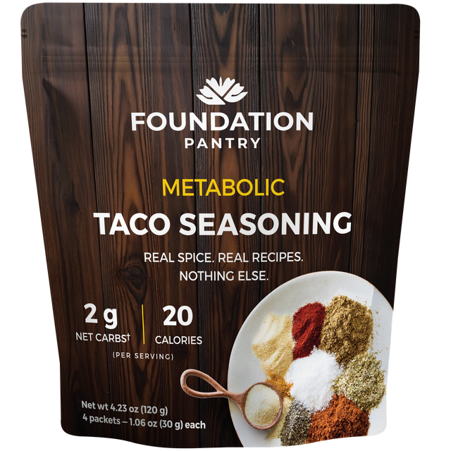 Foundation Pantry Metabolic Taco Seasoning, stand-up pouch with four seasoning packets, front view featuring assorted spices.