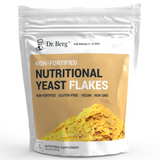 Nutritional Yeast Flakes, 8 ounces, front view, bag with Dr. Berg branding and flakes of yeast on the cover.