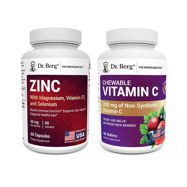 Two bottles of Dr. Berg supplements on a white background